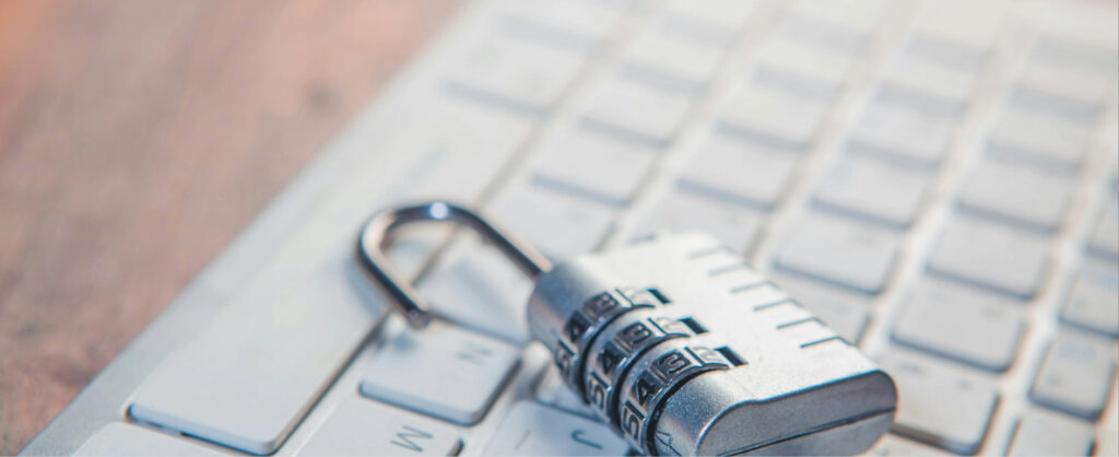 Image of keyboard with a lock on representing protecting against business fraud