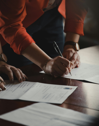 Professional reviewing tax documents at desk