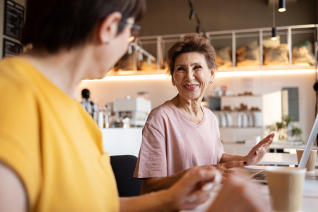 Finance professionals reviewing pension scheme reports