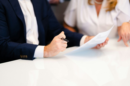 Audit professionals reviewing financial statements