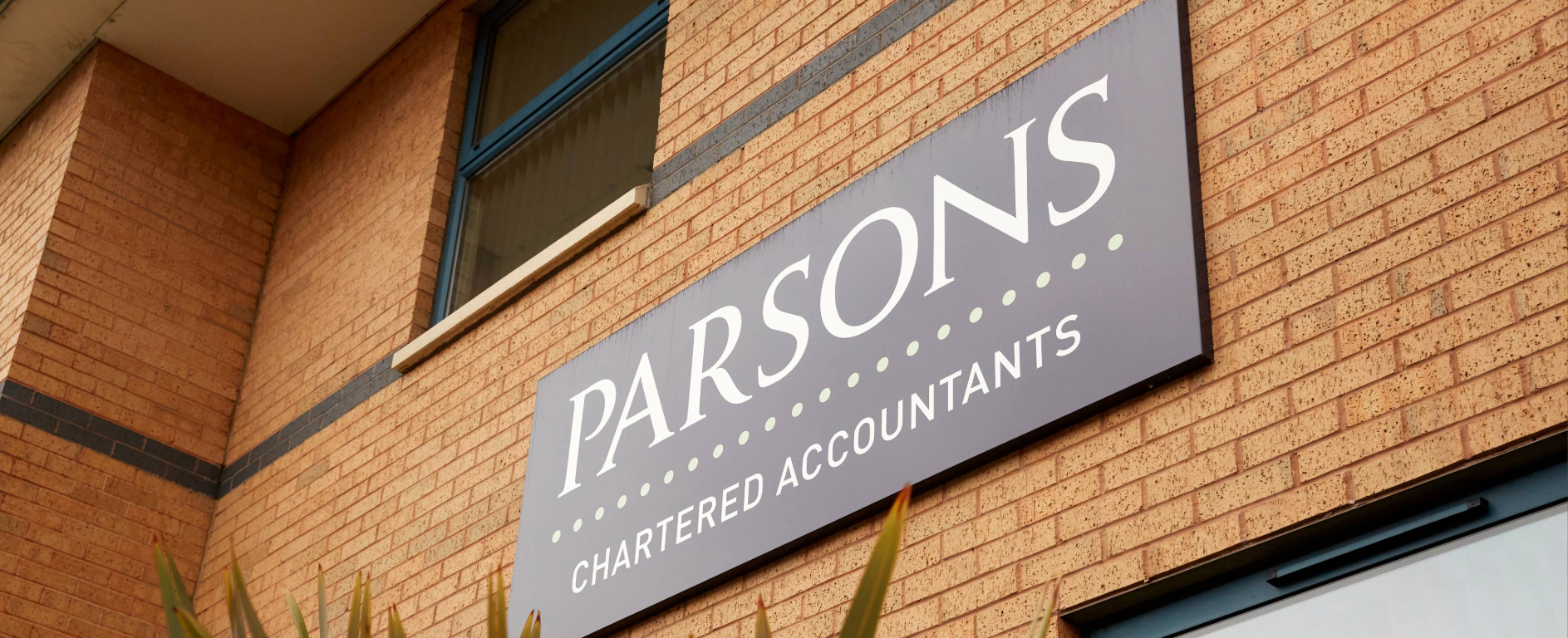 Parsons branding on exterior of building