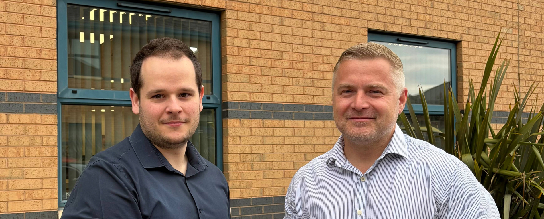 Eliot Clark and Kristian Sennett outside the Wakefield Parsons office